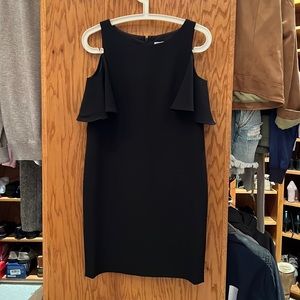 Perfect little black dress with zip up back and cut out shoulders